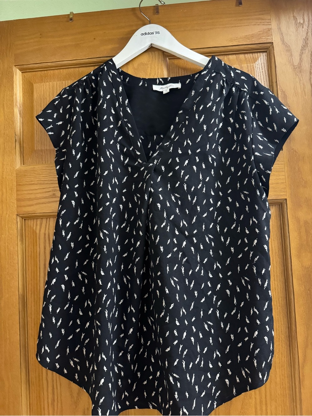 Black V-Neck Short Sleeve Blouse with White Feather Motif